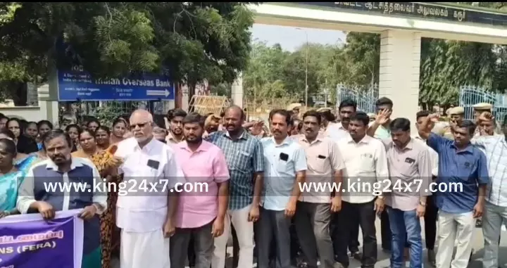 கரூரில் 9- அம்ச கோரிக்கைகளை வலியுறுத்தி ஆர்ப்பாட்டம் செய்து சாலை மறியல் போராட்டத்தில் ஈடுபட்ட வருவாய் துறை கூட்டமைப்பினர் 200-க்கும் மேற்பட்டோர் கைது.